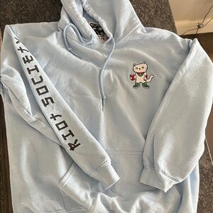 Riot Society Light Blue Hoodie with Cat and Text